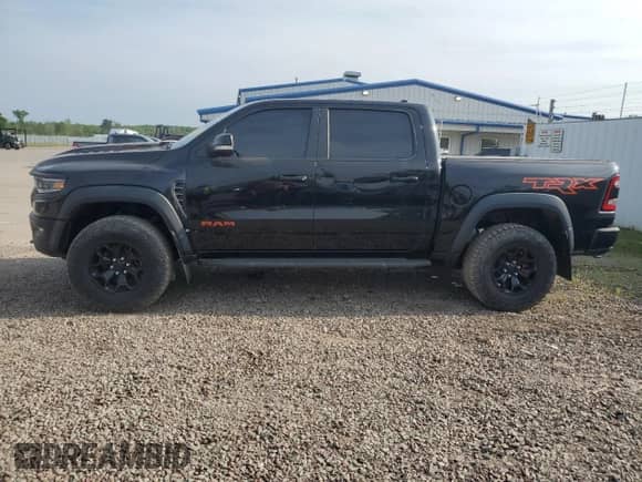 2021 Ram 1500 TRX z VIN 1C6SRFU99MN758770, wystawiony jako Copart lot #83874295 z przebiegiem 59 155 mil mil oraz Szkoda całkowita • Salvage title. Historia ofert i sprzedaży dostępna na DreamBid. Obrazek 12.