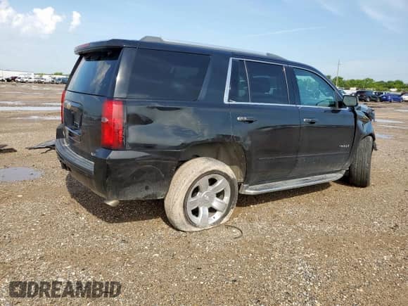 2017 Chevrolet Tahoe Premier with VIN 1GNSCCKC3HR219574, listed as a Copart auction lot 61045345 with 124,927 mi miles and Salvage title. Bid and sale history available at DreamBid. Image 3.