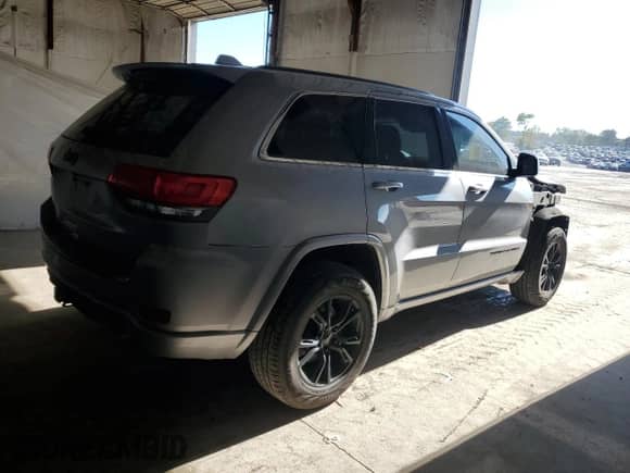 2015 Jeep Grand Cherokee Altitude with VIN 1C4RJFAG6FC777101, listed as a Copart auction lot 84589125 with 102,843 mi miles and Salvage title. Bid and sale history available at DreamBid. Image 3.