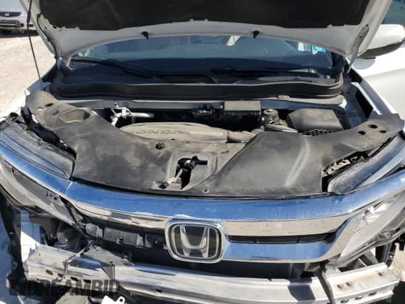 2020 Honda Pilot Touring 7-Passenger z VIN 5FNYF5H67LB021988, wystawiony jako Copart lot #47211215 z przebiegiem 99 698 mil mil oraz Szkoda całkowita • Salvage title. Historia ofert i sprzedaży dostępna na DreamBid. Obrazek 13.