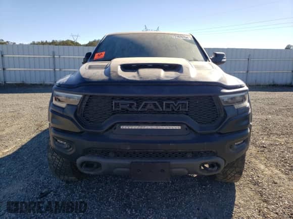 2021 Ram 1500 TRX z VIN 1C6SRFU97MN901179, wystawiony jako Copart lot #77978704 z przebiegiem 31 204 mil mil oraz Nie do naprawy • Non repairable. Historia ofert i sprzedaży dostępna na DreamBid. Obrazek 5.