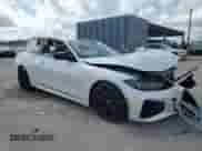 2025 BMW 4 Series 430i with VIN WBA33DB06SCS07578, listed as a Copart auction lot 43114995 with 5,169 mi miles and Salvage title. Bid and sale history available at DreamBid. Image 4.