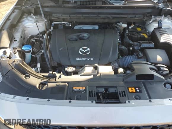 2024 Mazda CX-5 S Select z VIN JM3KFBBL6R0502168, wystawiony jako Copart lot #71203895 z przebiegiem 25 049 mil mil oraz Szkoda całkowita • Salvage title. Historia ofert i sprzedaży dostępna na DreamBid. Obrazek 11.