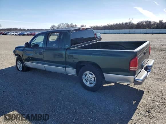 2001 Dodge Dakota Sport with VIN 1B7GL2AX31S212099, listed as a Copart auction lot 44619795 with 225,761 mi miles and Salvage title. Bid and sale history available at DreamBid. Image 2.