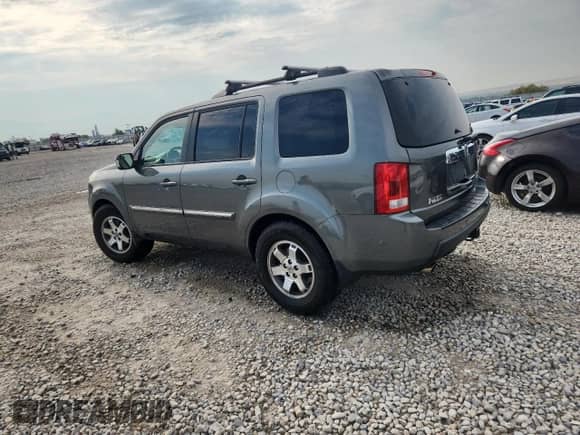 2009 Honda Pilot Touring with VIN 5FNYF48969B025883, listed as a Copart auction lot 70923065 with 192,552 mi miles and Salvage title. Bid and sale history available at DreamBid. Image 2.