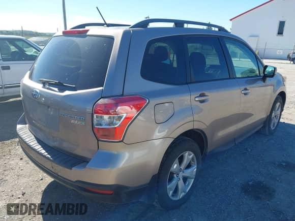 2014 Subaru Forester Premium with VIN JF2SJAEC4EH555980, listed as a IAAI auction lot 43108600 with 185,821 mi miles and . Bid and sale history available at DreamBid. Image 4.