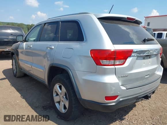 2012 Jeep Grand Cherokee Laredo z VIN 1C4RJEAG9CC151340, wystawiony jako IAAI lot #43249143 z przebiegiem 208 847 mil mil oraz . Historia ofert i sprzedaży dostępna na DreamBid. Obrazek 3.