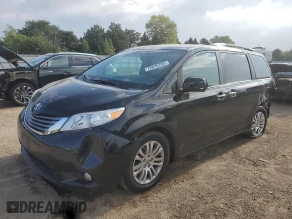 2015 Toyota Sienna XLE with VIN 5TDYK3DC5FS595095, listed as a Copart auction lot 72076705 with 97,540 mi miles and Salvage title. Bid and sale history available at DreamBid. Image 1.