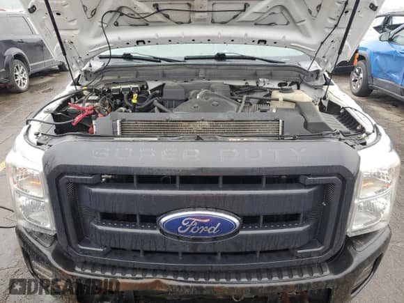 2013 Ford F-250 XL z VIN 1FT7X2A66DEB52530, wystawiony jako Copart lot #59683575 z przebiegiem 154 723 mil mil oraz Czysty tytuł • Clean title. Historia ofert i sprzedaży dostępna na DreamBid. Obrazek 11.