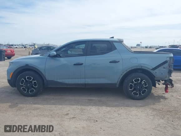 2023 Hyundai Santa Cruz SEL with VIN 5NTJBDAE3PH066962, listed as a IAAI auction lot 41688181 with 47,465 mi miles and . Bid and sale history available at DreamBid. Image 14.