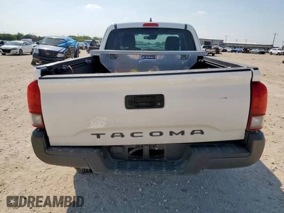 2019 Toyota Tacoma SR z VIN 5TFRX5GN9KX156923, wystawiony jako Copart lot #80000885 z przebiegiem 101 823 mil mil oraz Szkoda całkowita • Salvage title. Historia ofert i sprzedaży dostępna na DreamBid. Obrazek 6.