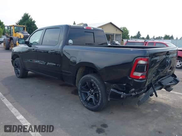 2024 Ram 1500 Big Horn with VIN 1C6SRFMT9RN169317, listed as a IAAI auction lot 43063387 with 27,303 mi miles and . Bid and sale history available at DreamBid. Image 3.