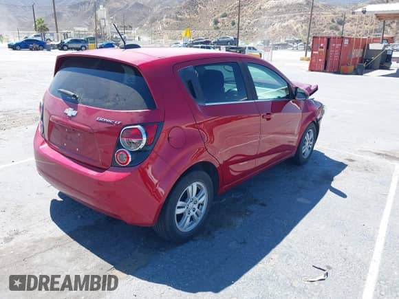 2015 Chevrolet Sonic LT with VIN 1G1JC6SGXF4108113, listed as a IAAI auction lot 42709302 with 82,024 mi miles and . Bid and sale history available at DreamBid. Image 4.