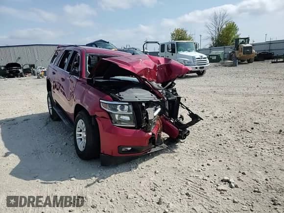 2015 Chevrolet Tahoe LT с VIN 1GNSKBKC2FR207958, выставлен на аукционе Copart как лот 72055175 с пробегом Не указан миль и На запчасти • Non repairable. История ставок и продаж доступна на DreamBid. Изображение 14.