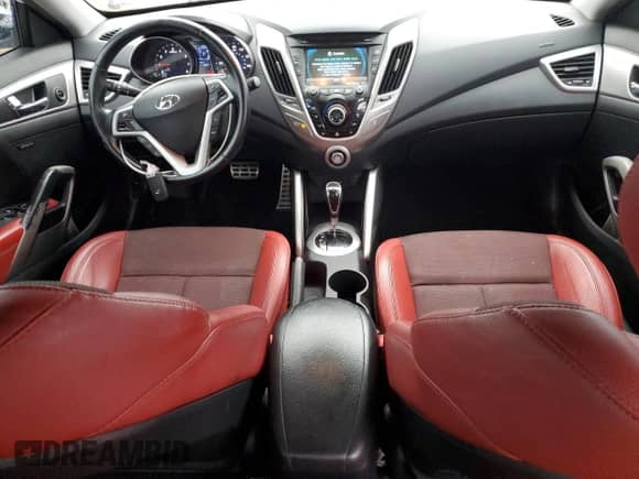 2013 Hyundai Veloster w/Black Int с VIN KMHTC6AD0DU149690, выставлен на аукционе Copart как лот 68201775 с пробегом 112 030 миль миль и Списание • Salvage title. История ставок и продаж доступна на DreamBid. Изображение 8.