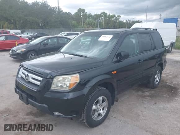 2006 Honda Pilot EX-L with VIN 5FNYF18786B016899, listed as a IAAI auction lot 43182632 with 418,378 mi miles and . Bid and sale history available at DreamBid. Image 2.