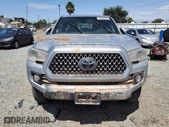 2018 Toyota Tacoma SR5 с VIN 3TMAZ5CN4JM071439, выставлен на аукционе Copart как лот 70869505 с пробегом 93 174 миль миль и Списание • Salvage title. История ставок и продаж доступна на DreamBid. Изображение 5.