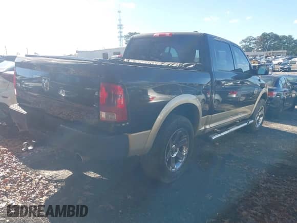 2011 Ram 1500 Outdoorsman with VIN 1D7RV1CT7BS633290, listed as a IAAI auction lot 40890733 with 167,346 mi miles and . Bid and sale history available at DreamBid. Image 4.