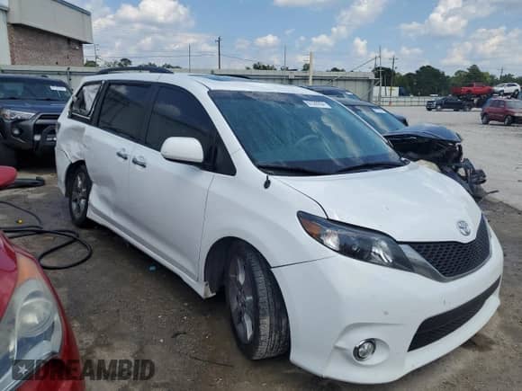 2014 Toyota Sienna SE with VIN 5TDXK3DC9ES431830, listed as a Copart auction lot 67330254 with 77,238 mi miles and Salvage title. Bid and sale history available at DreamBid. Image 4.