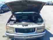 1994 GMC Sierra 1500 z VIN 2GTEC19K7R1555049, wystawiony jako IAAI lot #42316465 z przebiegiem 242 883 mil mil oraz . Historia ofert i sprzedaży dostępna na DreamBid. Obrazek 10.