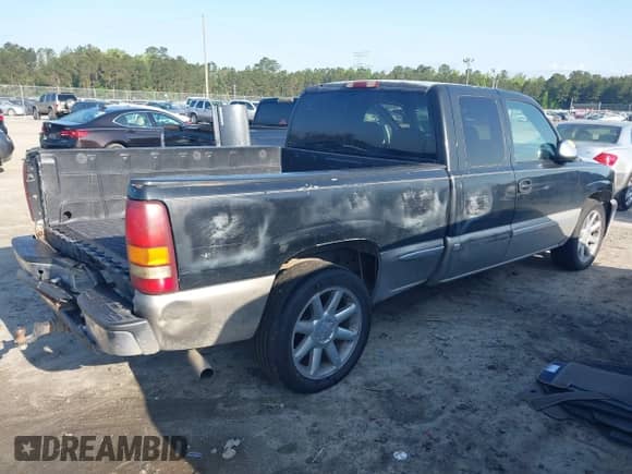 2000 GMC Sierra 1500 SLE with VIN 2GTEC19TXY1312634, listed as a IAAI auction lot 41963933 with 307,341 mi miles and . Bid and sale history available at DreamBid. Image 4.