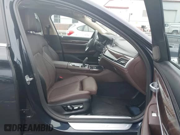 2019 BMW 7 Series 740i xDrive with VIN WBA7E4C52KGV70359, listed as a IAAI auction lot 41421504 with 55,734 mi miles and . Bid and sale history available at DreamBid. Image 5.