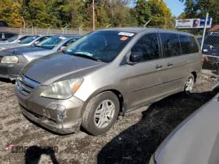 2005 Honda Odyssey LX с VIN 5FNRL38255B031873, выставлен на аукционе Copart как лот 87105105 с пробегом 301 626 миль миль и Списание • Salvage title. История ставок и продаж доступна на DreamBid. Изображение 1.