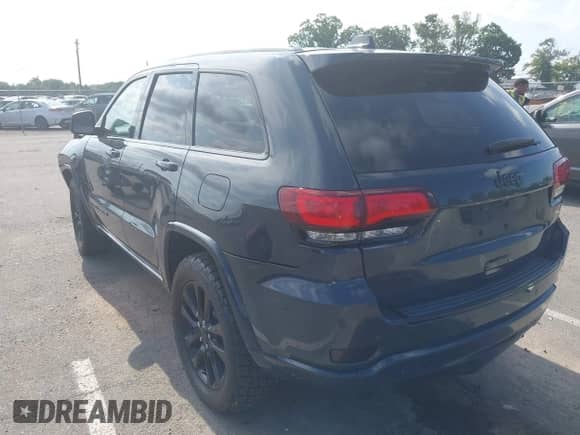 2017 Jeep Grand Cherokee Altitude with VIN 1C4RJFAG1HC895527, listed as a IAAI auction lot 43058018 with 78,447 mi miles and . Bid and sale history available at DreamBid. Image 3.