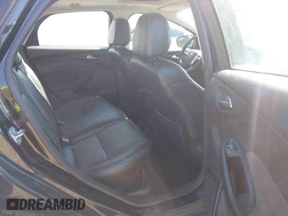 2014 Ford Focus Titanium with VIN 1FADP3J27EL227311, listed as a IAAI auction lot 41904675 with 180,459 mi miles and . Bid and sale history available at DreamBid. Image 8.