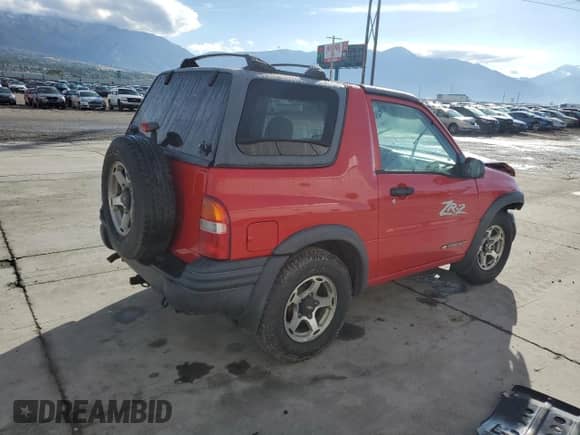 2001 Chevrolet Tracker with VIN 2CNBJ78C616925867, listed as a Copart auction lot 86811305 with Not provided miles and Salvage title. Bid and sale history available at DreamBid. Image 3.