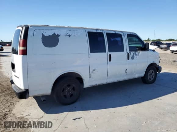 2003 Chevrolet Express Cargo с VIN 1GCFG15X031106612, выставлен на аукционе Copart как лот 48154145 с пробегом 256 352 миль миль и Списание • Salvage title. История ставок и продаж доступна на DreamBid. Изображение 3.