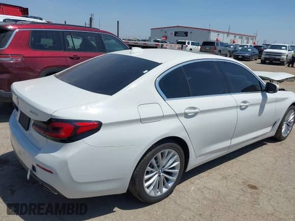 2021 BMW 5 Series 530i with VIN WBA53BH06MCF67900, listed as a IAAI auction lot 42504239 with Not provided miles and . Bid and sale history available at DreamBid. Image 4.