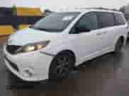 2014 Toyota Sienna SE with VIN 5TDXK3DC8ES441989, listed as a IAAI auction lot 43420437 with 183,733 mi miles and . Bid and sale history available at DreamBid. Image 2.