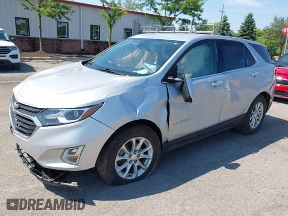 2019 Chevrolet Equinox LT z VIN 2GNAXJEV7K6230579, wystawiony jako IAAI lot #42834271 z przebiegiem 96 912 mil mil oraz . Historia ofert i sprzedaży dostępna na DreamBid. Obrazek 2.
