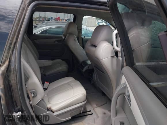2014 Chevrolet Traverse LT z VIN 1GNKRHKD1EJ318053, wystawiony jako IAAI lot #42562508 z przebiegiem 93 544 mil mil oraz . Historia ofert i sprzedaży dostępna na DreamBid. Obrazek 8.