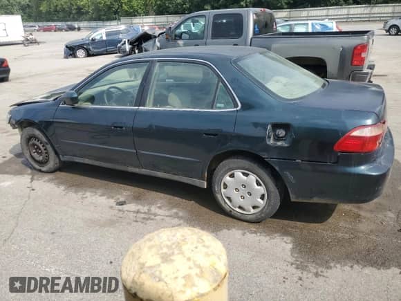 1999 Honda Accord LX with VIN 1HGCG6654XA061517, listed as a Copart auction lot 67732945 with 124,252 mi miles and Salvage title. Bid and sale history available at DreamBid. Image 2.