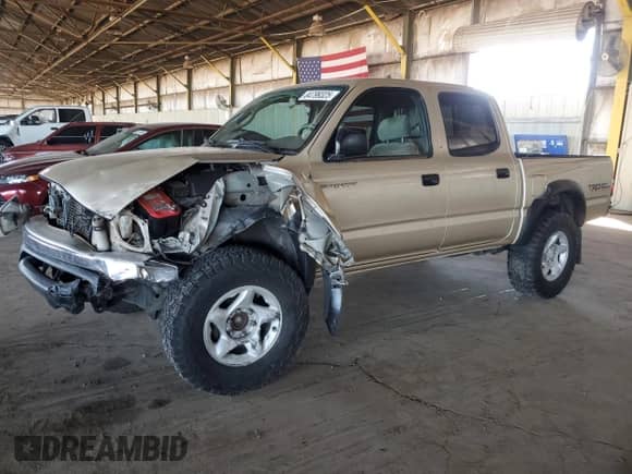 2001 Toyota Tacoma PreRunner z VIN 5TEGN92N71Z859665, wystawiony jako Copart lot #84799325 z przebiegiem 202 008 mil mil oraz Szkoda całkowita • Salvage title. Historia ofert i sprzedaży dostępna na DreamBid. Obrazek 1.
