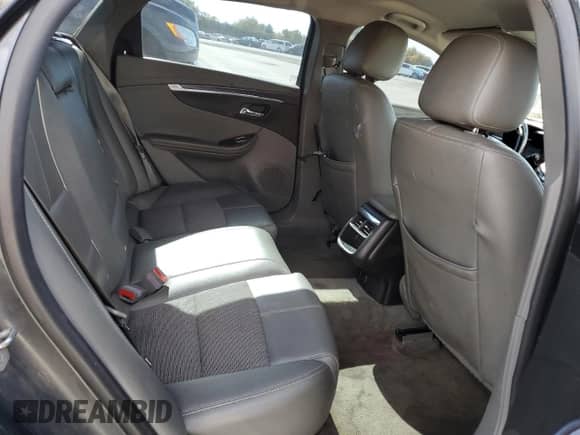 2015 Chevrolet Impala LT z VIN 1G1125S37FU111884, wystawiony jako Copart lot #82607565 z przebiegiem 163 164 mil mil oraz Szkoda całkowita • Salvage title. Historia ofert i sprzedaży dostępna na DreamBid. Obrazek 10.