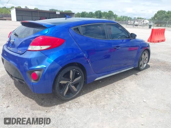 2013 Hyundai Veloster Turbo с VIN KMHTC6AE2DU163910, выставлен на аукционе IAAI как лот 42880099 с пробегом 244 002 миль миль и . История ставок и продаж доступна на DreamBid. Изображение 4.