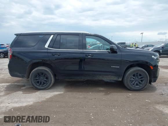 2021 Chevrolet Tahoe LT z VIN 1GNSKNKD2MR120746, wystawiony jako IAAI lot #42348341 z przebiegiem 85 070 mil mil oraz . Historia ofert i sprzedaży dostępna na DreamBid. Obrazek 13.