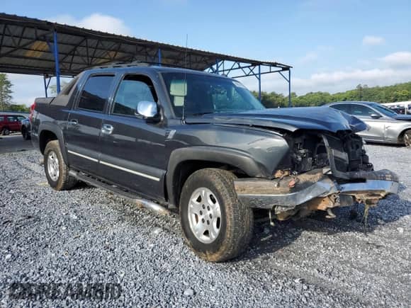 2003 Chevrolet Avalanche с VIN 3GNEC13T33G228297, выставлен на аукционе Copart как лот 69616165 с пробегом Не указан миль и Списание • Salvage title. История ставок и продаж доступна на DreamBid. Изображение 4.