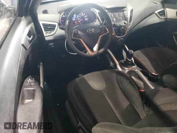 2012 Hyundai Veloster w/Black Int z VIN KMHTC6AD3CU078659, wystawiony jako Copart lot #71902465 z przebiegiem 130 632 mil mil oraz Szkoda całkowita • Salvage title. Historia ofert i sprzedaży dostępna na DreamBid. Obrazek 8.