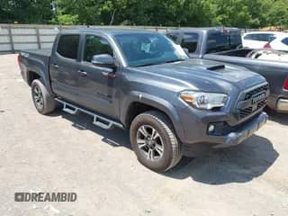 2019 Toyota Tacoma SR z VIN 3TMCZ5AN7KM195380, wystawiony jako IAAI lot #42659080 z przebiegiem 105 174 mil mil oraz . Historia ofert i sprzedaży dostępna na DreamBid. Obrazek 1.