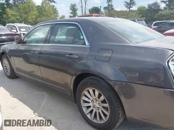 2013 Chrysler 300 with VIN 2C3CCAAG3DH588343, listed as a IAAI auction lot 43153565 with 169,165 mi miles and . Bid and sale history available at DreamBid. Image 14.