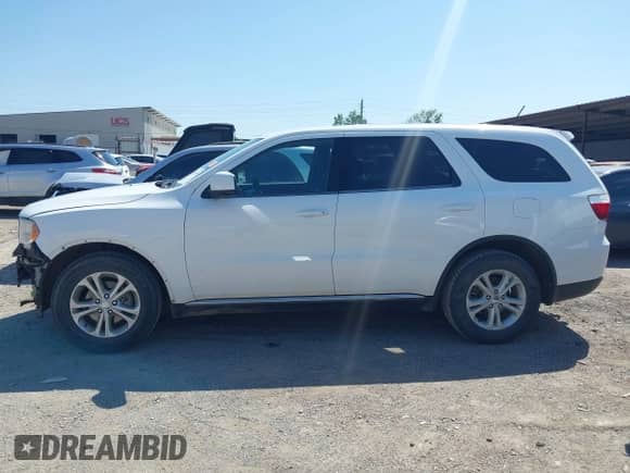 2013 Dodge Durango SXT with VIN 1C4RDHAG1DC678220, listed as a IAAI auction lot 41992038 with 166,725 mi miles and . Bid and sale history available at DreamBid. Image 15.