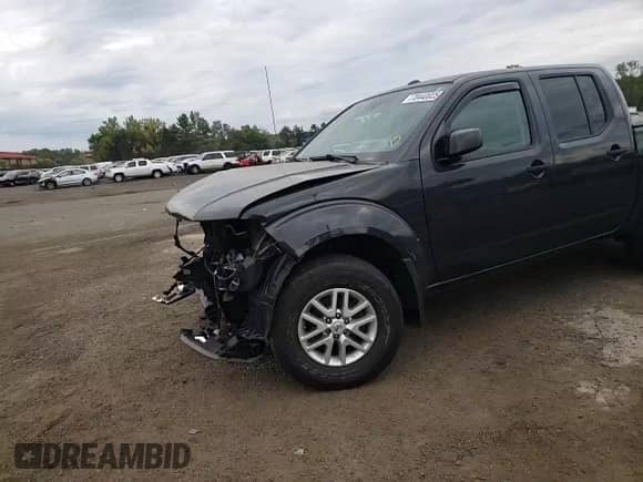 2015 Nissan Frontier SV with VIN 1N6AD0EV4FN727504, listed as a Copart auction lot 70440025 with 119,381 mi miles and Salvage title. Bid and sale history available at DreamBid. Image 13.