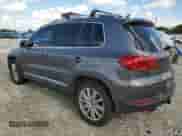 2012 Volkswagen Tiguan S с VIN WVGAV7AX4CW000140, выставлен на аукционе Copart как лот 80901355 с пробегом 133 056 миль миль и Списание • Salvage title. История ставок и продаж доступна на DreamBid. Изображение 2.