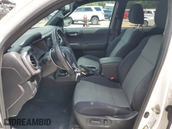 2020 Toyota Tacoma TRD Off Road с VIN 3TMCZ5AN4LM323432, выставлен на аукционе Copart как лот 59711425 с пробегом 46 664 миль миль и Списание • Salvage title. История ставок и продаж доступна на DreamBid. Изображение 7.