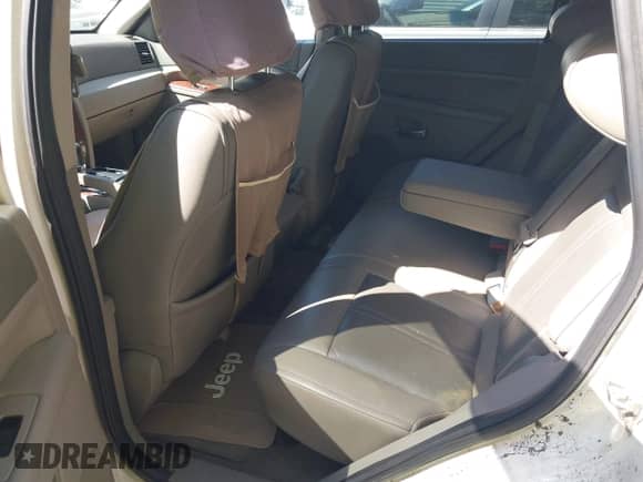 2005 Jeep Grand Cherokee Limited z VIN 1J4HR58295C584801, wystawiony jako IAAI lot #43115727 z przebiegiem 171 432 mil mil oraz . Historia ofert i sprzedaży dostępna na DreamBid. Obrazek 8.