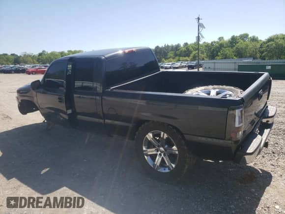 2003 GMC Sierra 1500 SLE with VIN 2GTEK19T331259948, listed as a Copart auction lot 52145845 with 214,374 mi miles and Salvage title. Bid and sale history available at DreamBid. Image 2.